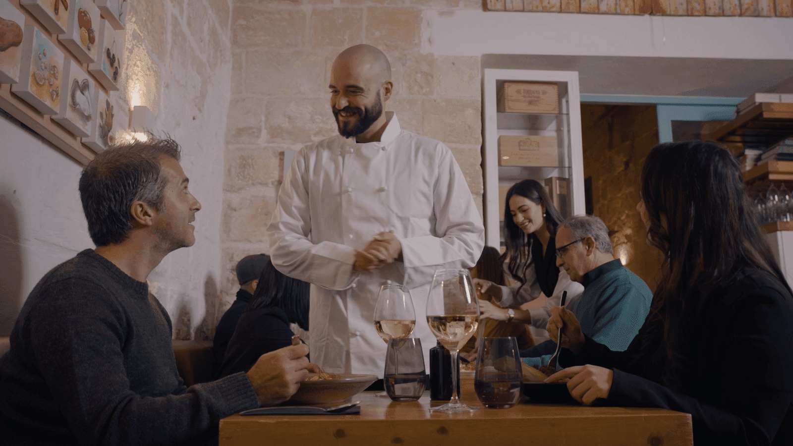 A shot from a commercial filmed for APS bank - a chef meets his patrons